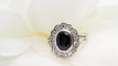 Bague Bague marguerite en or blanc, saphir et diamants 58 Facettes 29977