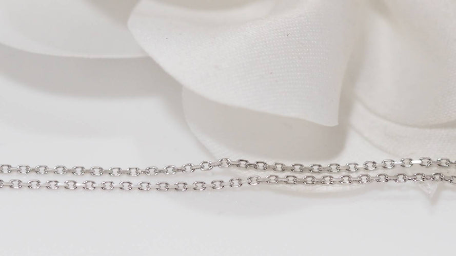 Collier Collier pendentif en or blanc, diamants et Rubis en poire 58 Facettes 31209
