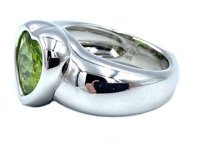 Bague PIAGET. Bague or blanc 18K et péridot 58 Facettes