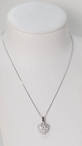 Collier Collier Cartier pendentif cœur, or blanc et diamants 58 Facettes 13807
