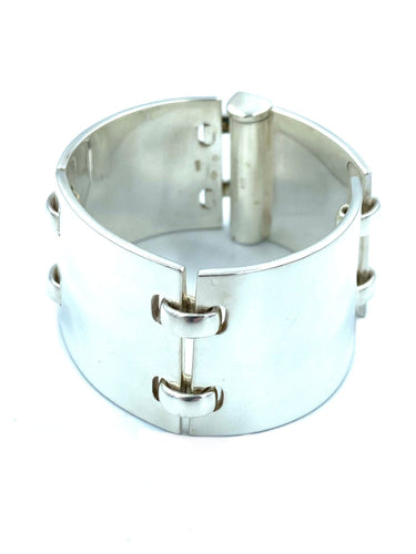 Bracelet HERMÈS. Bracelet manchette articulée argent 58 Facettes