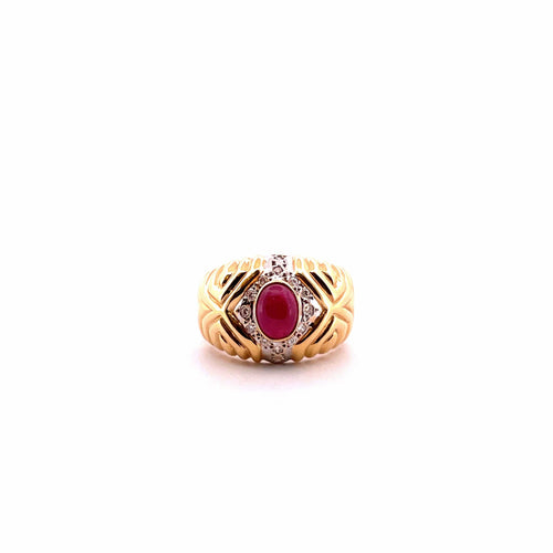Bague Bague vintage en or jaune, rubis cabochon et diamants 58 Facettes