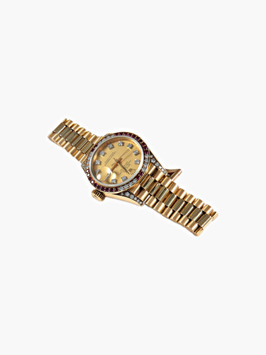 Montre Montre Rolex Président or jaune, diamants et rubis 58 Facettes