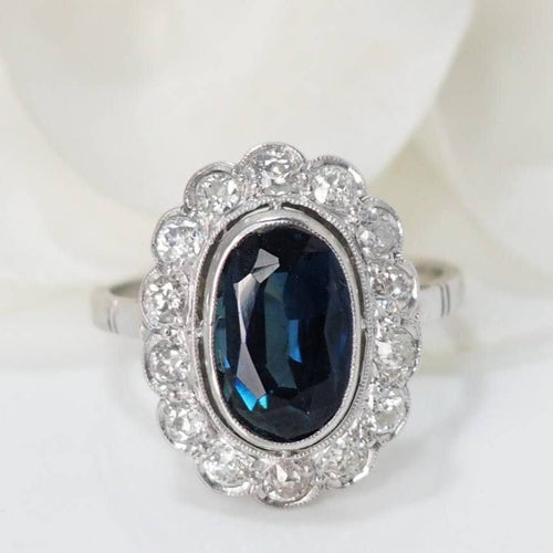 Bague 52 Bague pompadour en or blanc, saphir et diamants 58 Facettes 32110