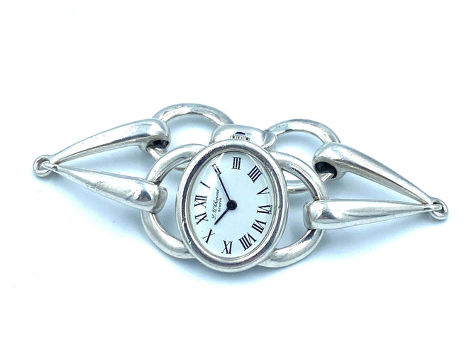 Montre CHOPARD. Montre vintage argent et mouvement mécanique 58 Facettes