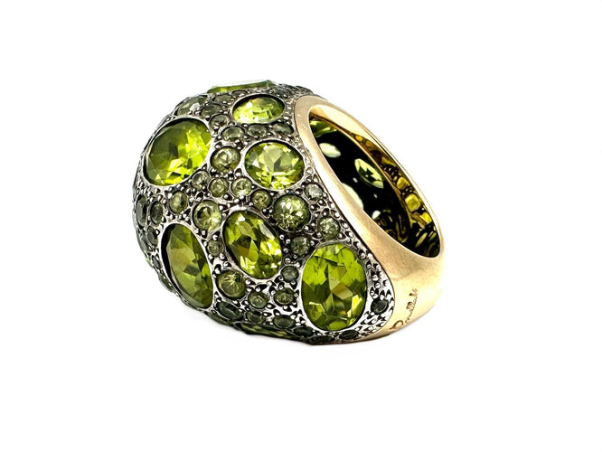 Bague 51 POMELLATO. Collection Tabou, bague or et argent ornée de péridots 58 Facettes