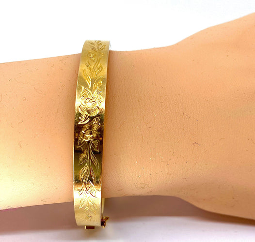 Bracelet Bracelet jonc ouvrant ciselé de roses et de feuilles 58 Facettes