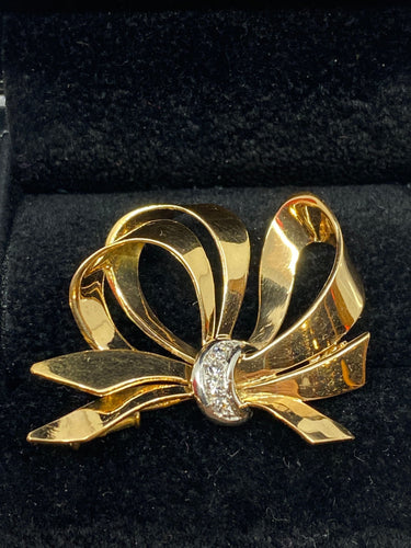 Broche Broche noeud diamants 58 Facettes