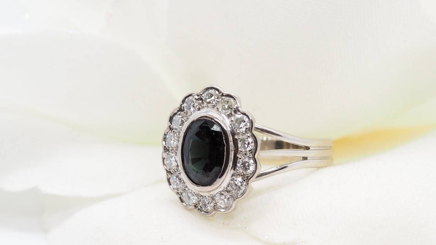 Bague Bague marguerite en or blanc, saphir et diamants 58 Facettes 29977