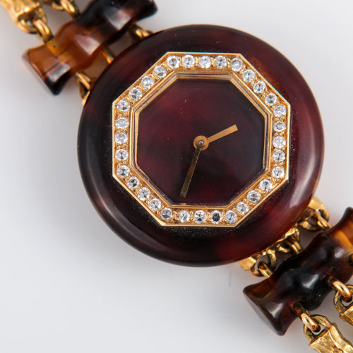 Montre Boucheron Paris - Montre en or et écaille de tortue 58 Facettes