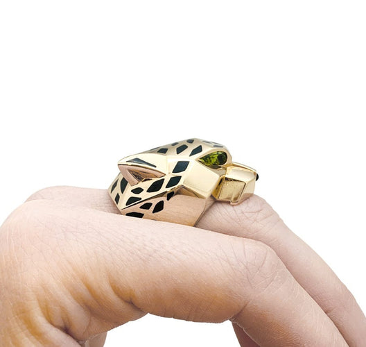 Bague 64 Bague Cartier modèle "Panthère" en or jaune, péridots, laque, onyx. 58 Facettes 29819-1