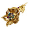 Broche Broche Cartier, "Fleur" en or jaune, diamants, émeraudes, rubis et saphirs. 58 Facettes 30236