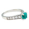 Bague 57 Bague émeraude en or blanc et diamants. 58 Facettes 30589