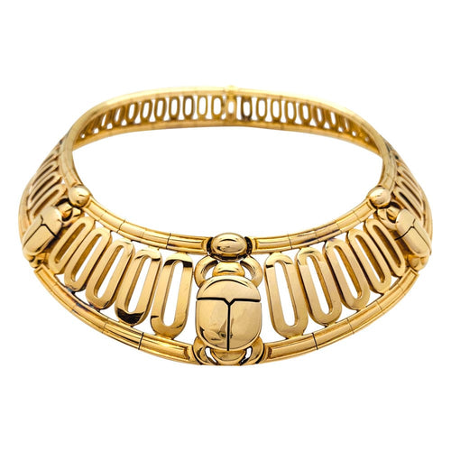 Collier Collier torque Cartier, "Scarabée", en or jaune. 58 Facettes 29929