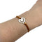 Bracelet Bracelet O.J.Perrin, "Coeur Légendes", or blanc sur cordon. 58 Facettes 30355