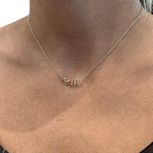 Collier Collier Dior "Oui" en or blanc et diamant. 58 Facettes 30560