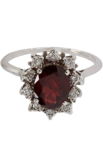 Bague Bague marguerite grenat et diamants 58 Facettes 037211