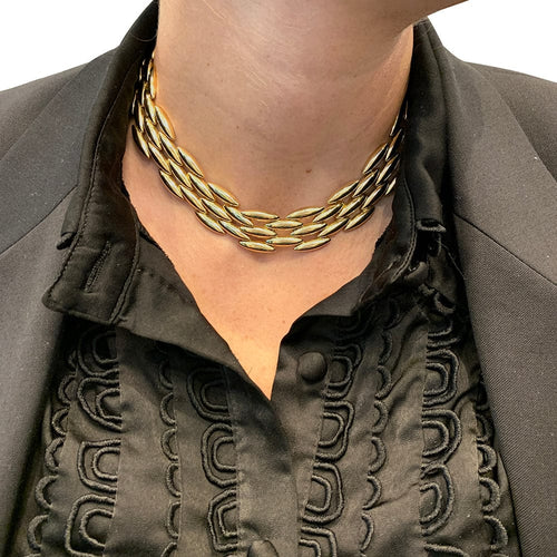 Collier Collier Cartier "Gentiane" en or jaune. 58 Facettes 30485