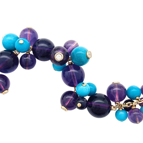 Collier Collier Cartier "Délices de Goa" en or jaune, améthyste, turquoises et diamants. 58 Facettes 30007