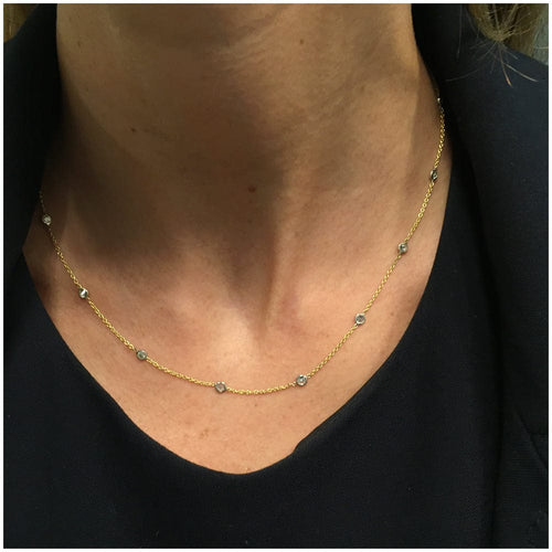 Collier Collier en deux tons d'or serti de 15 diamants en serti clos. 58 Facettes 30534