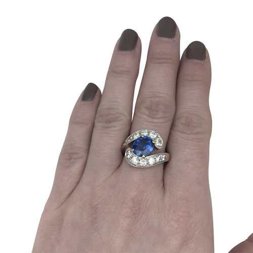 Bague 52 Bague Tourbillon en or jaune et blanc, saphir et diamants. 58 Facettes 28146