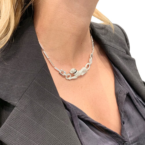 Collier Collier Cartier "Panthère" en or blanc, diamants, émeraude et onyx. 58 Facettes 29385