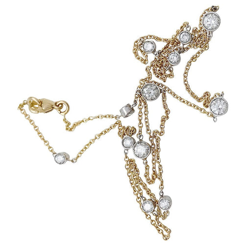 Collier Collier gouttière en or jaune, blanc et diamants. 58 Facettes 30149
