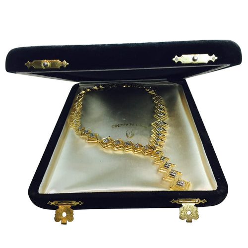 Collier Collier cravate Ilias Lalaounis en or jaune et diamants. 58 Facettes 27956