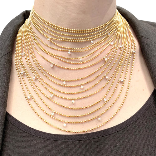 Collier Collier Cartier "Draperie" en or jaune, or blanc et diamants. 58 Facettes 29547