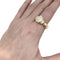 Bague 67 Bague Cartier modèle "Panthère" en or jaune, onyx, émeraudes et diamants. 58 Facettes 29715-1