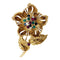 Broche Broche Cartier, "Fleur" en or jaune, diamants, émeraudes, rubis et saphirs. 58 Facettes 30236