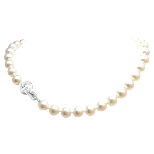 Collier Collier de perles Cartier collection "Agrafe", fermoir en or blanc et diamants. 58 Facettes 26958