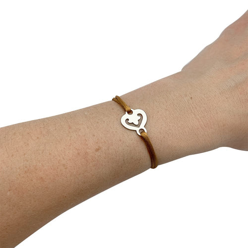 Bracelet Bracelet O.J.Perrin, "Coeur Légendes", or blanc sur cordon. 58 Facettes 30355