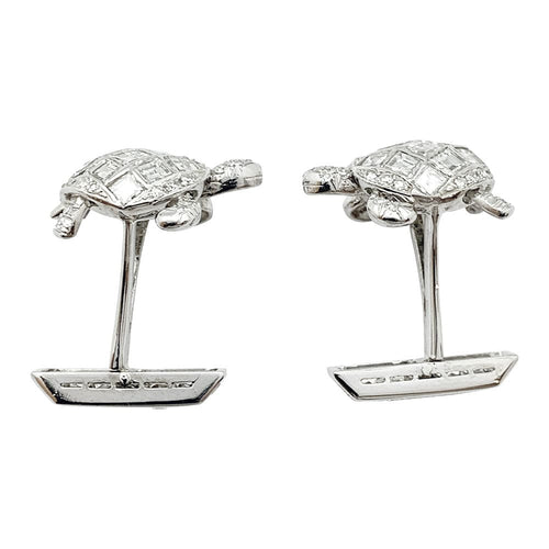 Boutons de manchette Boutons de manchette "Tortues" en platine, sertis de diamants. 58 Facettes 30067