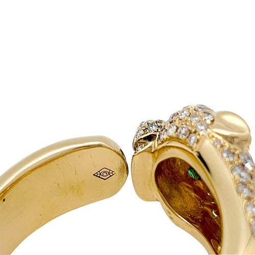 Bague 67 Bague Cartier modèle "Panthère" en or jaune, onyx, émeraudes et diamants. 58 Facettes 29715-1