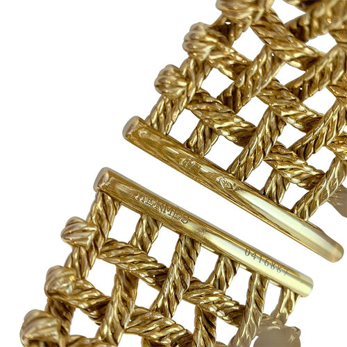 Bracelet Bracelet Manchette Hermès en or jaune. 58 Facettes 30059
