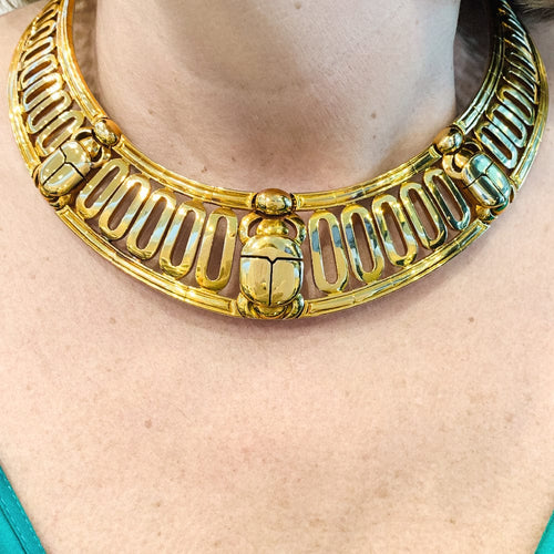 Collier Collier torque Cartier, "Scarabée", en or jaune. 58 Facettes 29929