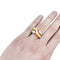 Bague 53 Bague entrelacée en or jaune et diamants. 58 Facettes 29741