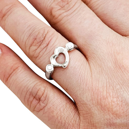 Bague 51 Bague Tiffany & Co. "Open heart" en argent et diamants. 58 Facettes 30462