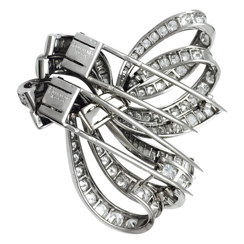 Clip Double clip Boucheron, "Noeud" en platine, or blanc et diamants. 58 Facettes 27909