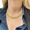 Collier Un collier vintage en or jaune. 58 Facettes 30090