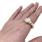Bague 67 Bague Cartier modèle "Panthère" en or jaune, onyx, émeraudes et diamants. 58 Facettes 29715-1