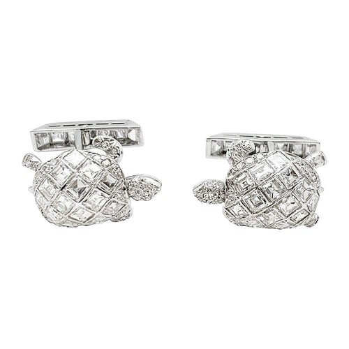 Boutons de manchette Boutons de manchette "Tortues" en platine, sertis de diamants. 58 Facettes 30067