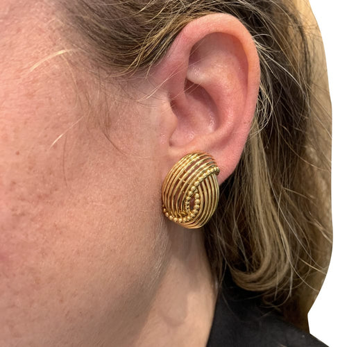 Boucles d'oreilles Boucles d'oreilles Cartier "Noeuds" en or jaune. 58 Facettes 30137