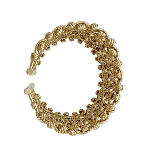 Bracelet Bracelet Manchette Hermès en or jaune. 58 Facettes 30059