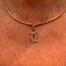 Collier Collier Cartier "Double C" en or jaune et diamants. 58 Facettes 30408