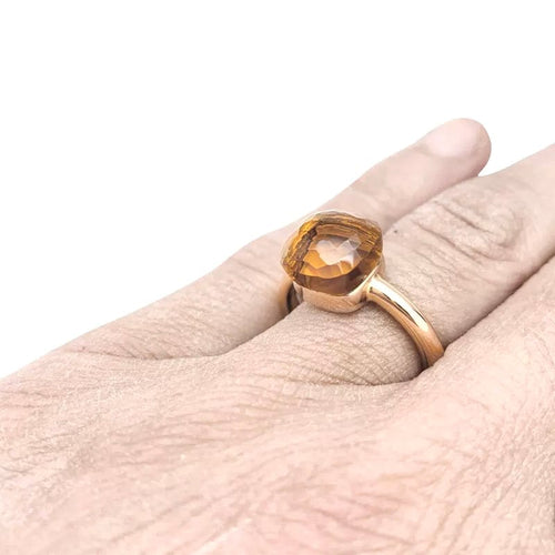 Bague 54 Bague Pomellato "Nudo" en or rose 750/000 sertie d'une citrine. 58 Facettes 30328
