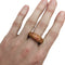 Bague 55 Bague Chaumet modèle "Caviar" en or jaune, saphirs oranges. 58 Facettes 24385-1