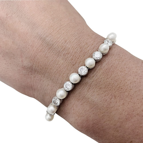 Collier Collier Van Cleef & Arpels transformable en platine, perles fines et diamants. 58 Facettes 30173