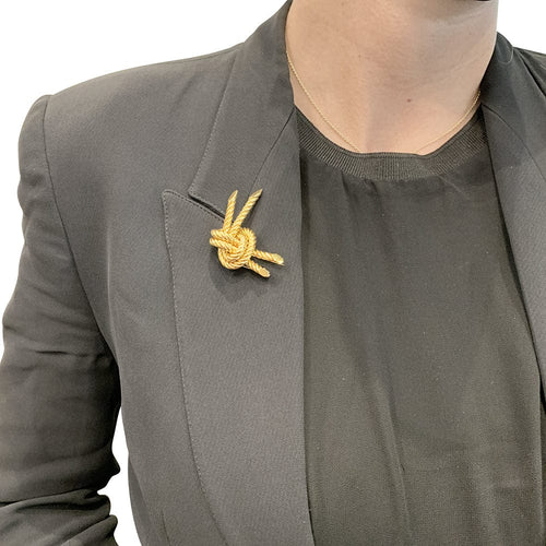 Broche Broche Hermès "Noeud" en or jaune. 58 Facettes 29964